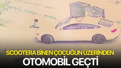 Scootera binen çocuğun üzerinden otomobil geçti