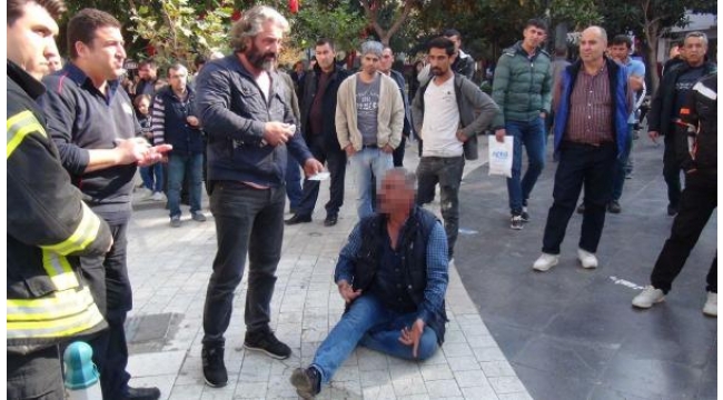 Üzerine benzin döküp meydanda intihara kalkıştı