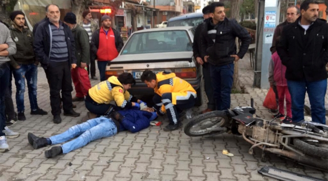 Otomobille çarpışan motosiklet sürücüsü yaralandı