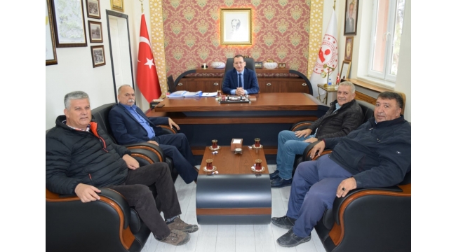Esnaf Kefalet Başkanı Coşkun ve yönetiminden Kaymakam Yılmaz'a ziyaret