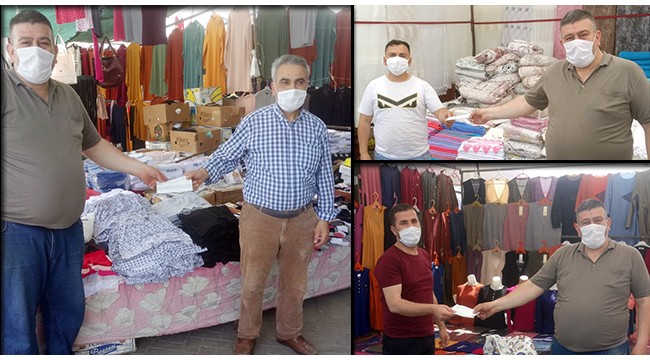 Oda başkanı Çiçekçi üyelerine maske dağıttı