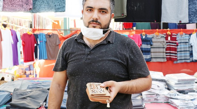 Pazarda bulduğu para ve altın dolu cüzdanı sahibine teslim etti