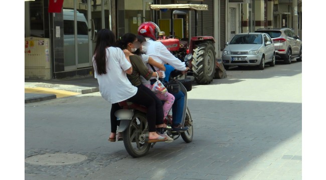 Bir motosiklet üzerinde 5 kişi!