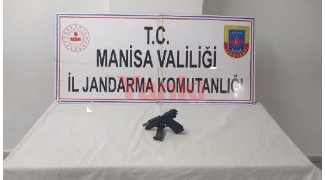 Otomobilde ruhsatsız tabanca ele geçirildi