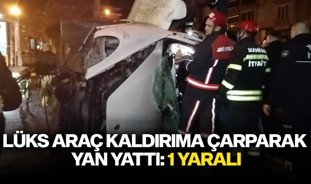 Lüks araç kaldırıma çarparak yan yattı: 1 yaralı