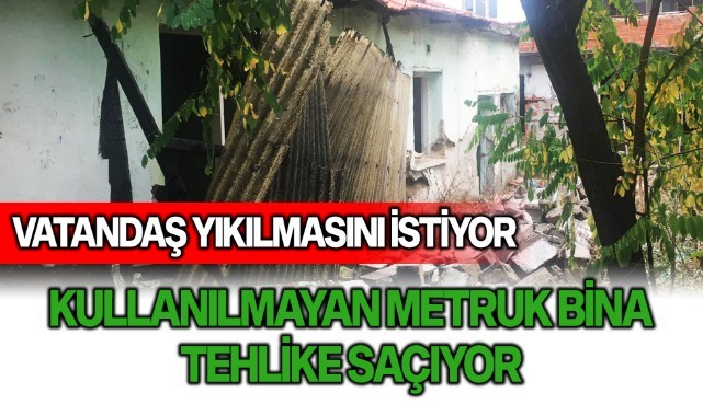 Kullanılmayan metruk bina tehlike saçıyor