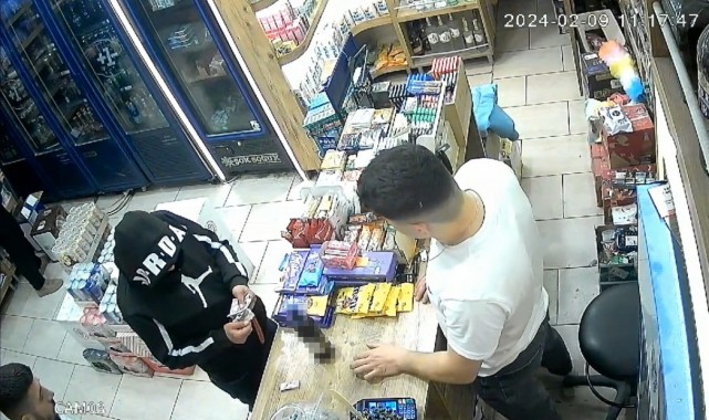 İşyerine "silahımı denedim" saldırısı kamerada