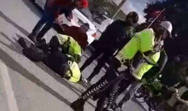 Çevirme yapan trafik polisine motosikletle çarpıp kaçtı!