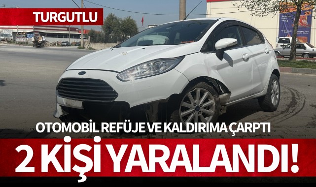 Turgutlu'da otomobil refüje ve kaldırıma çarptı: 2 yaralı