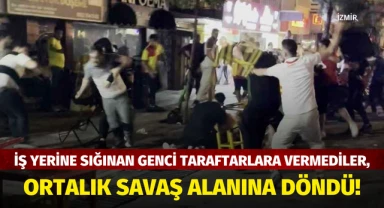 İş yerine sığınan genci taraftarlara vermediler, ortalık savaş alanına döndü!