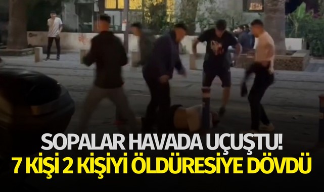 Sopalar havada uçuştu! 7 kişi 2 kişiyi öldüresiye dövdü