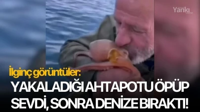 İlginç görüntüler: Yakaladığı ahtapotu öpüp sevdi, sonra denize bıraktı!
