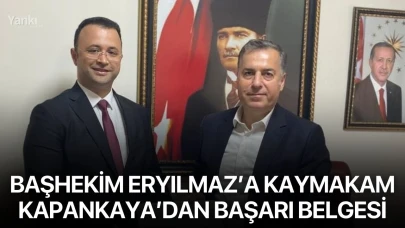 Başhekim Eryılmaz’a Kaymakam Kapankaya’dan başarı belgesi