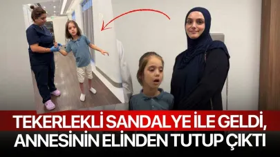 Tekerlekli sandalye ile geldi, annesinin elinden tutup çıktı
