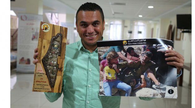 AA foto muhabiri, "2015 Esirlere Özgürlük" Fotoğraf Yarışması'nda birinci oldu