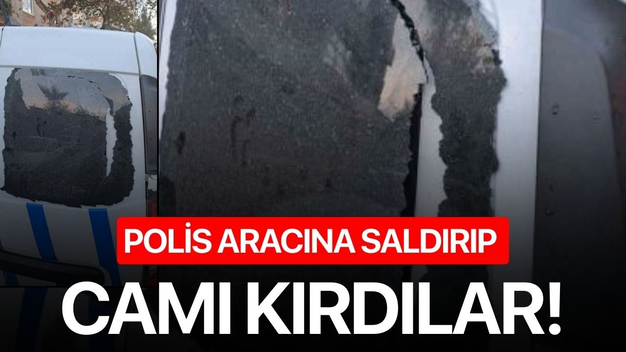 Polis aracına saldırıp camı kırdılar!