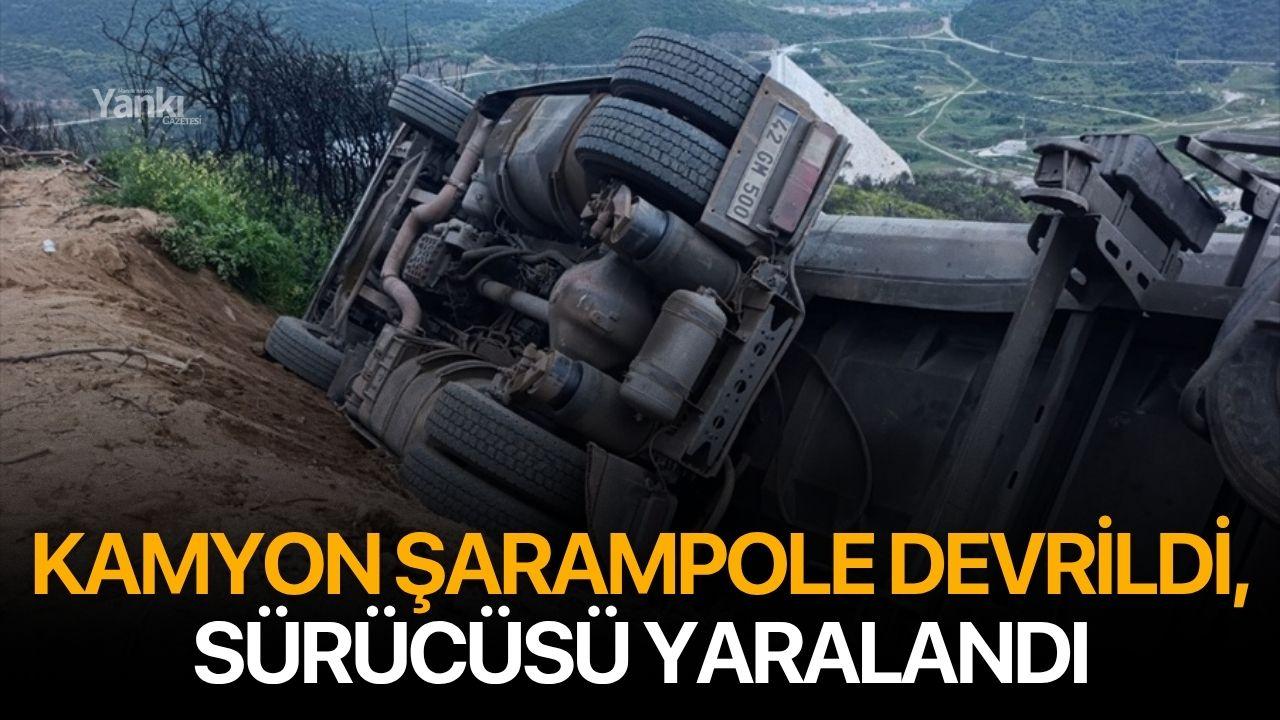 Kamyon şarampole devrildi, sürücüsü yaralandı